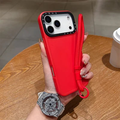 For iPhone 18 Pro Max / 17 Pro Max Case Black Lens Frame Shockproof TPU PC Phone Back Cover with Wrist Strap - Red