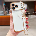 For iPhone 18 Pro Max / 17 Pro Max Case Electroplated Heart Pattern TPU Phone Back Cover with Wristband Kickstand - Ivory White